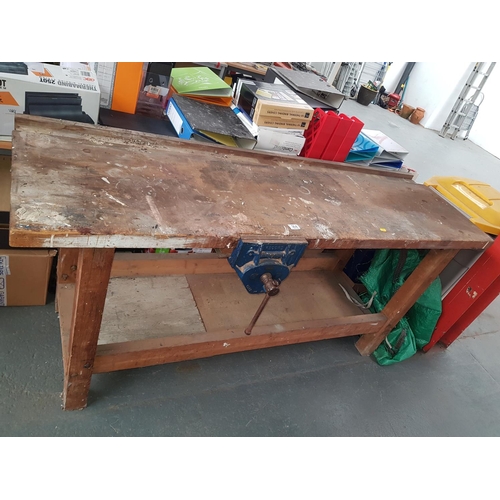 364 - A wooden work bench with vice