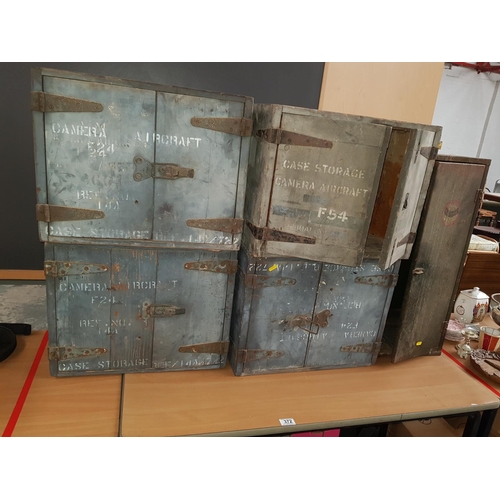 372 - Four wooden storage boxes and a metal cabinet