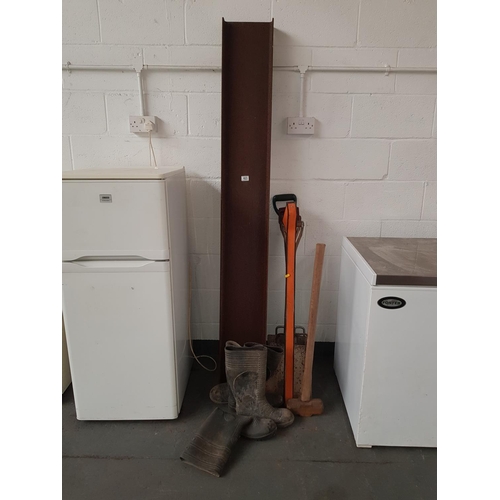 423 - A steel RSJ, wellies, gardening tools etc