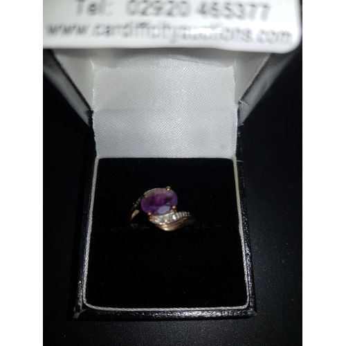 272 - A 9K gold and Amethyst ladies ring Size - L