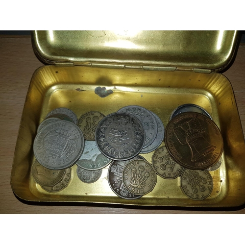 285 - A WW2 Christmas tin containing coins