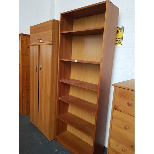 514 - A double wardrobe and a large bookcase
