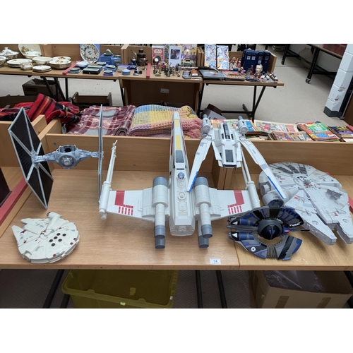 14 - A collection of Star Wars spaceships including Millennium Falcons, Thai Fighter etc.