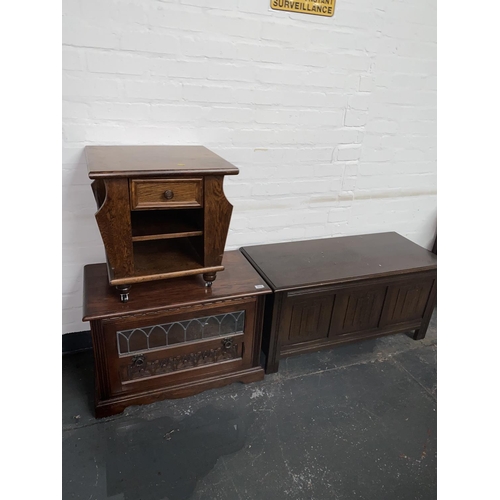 510 - A blanket box, magazine table and a cabinet