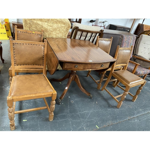 337 - A drop leaf dining table and four chairs