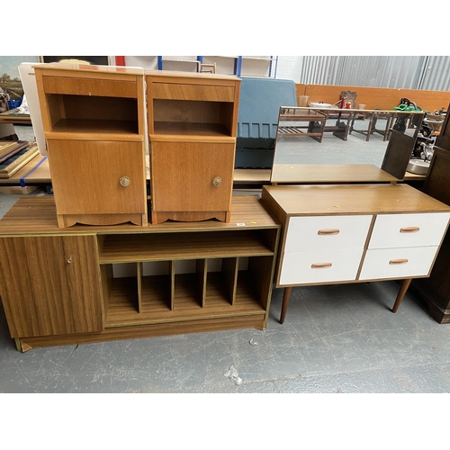 360 - A sideboard, two bedside cabinets and a dressing table