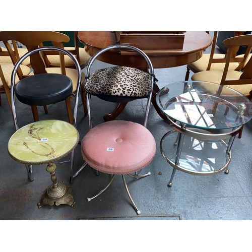 530 - A glass top side table,bar stools etc.