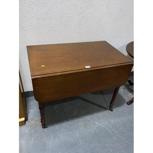 107 - A mahogany Pembroke table with single drawer