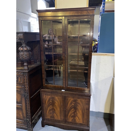 111 - A small Edwardian mahogany chiffonier bookcase