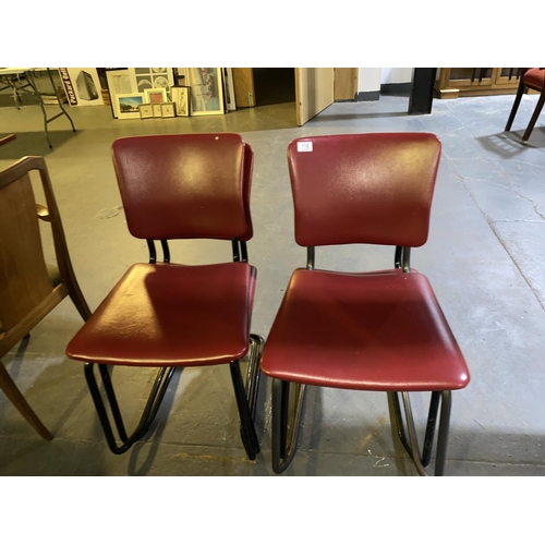 118 - A set of 4 metal Remploy stacking chairs