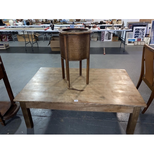 120 - An Edwardian mahogany ice bucket (lid missing) and a pine cut down kitchen table