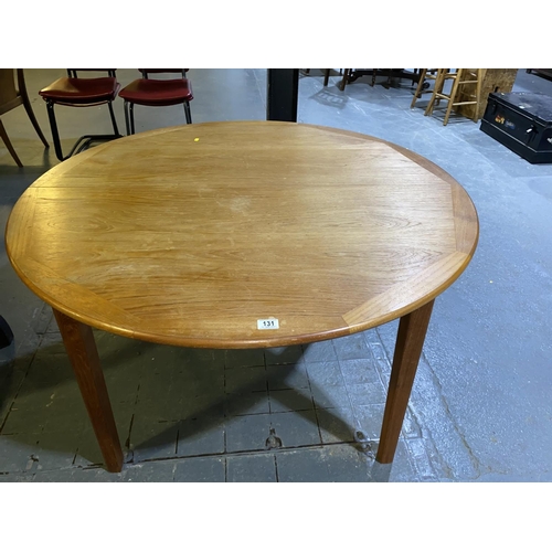 131 - A teak, Danish circular dining table