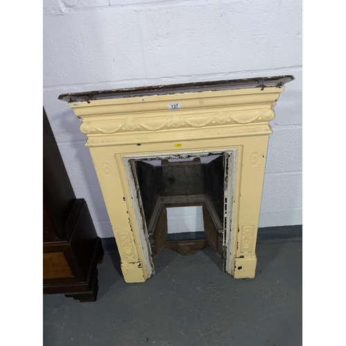 137 - A cast iron fire surround