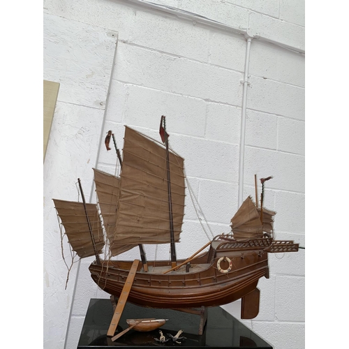 63 - A wooden model ship