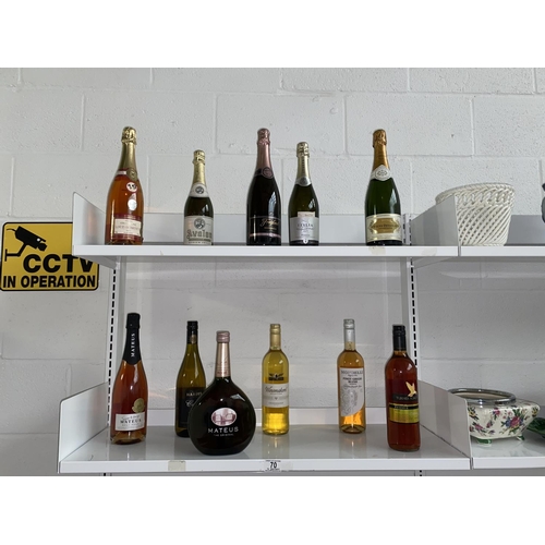 70 - A collection of alcohol including champagne, prosecco, rose etc- 2 shelves