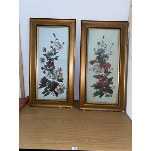 82 - A pair of framed floral pictures