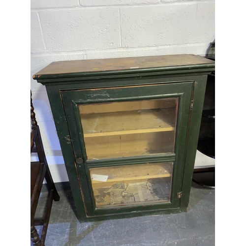 112 - A painted pine glass fronted bookcase