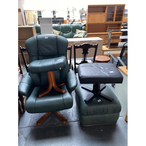 346 - A green leather armchair and three stools