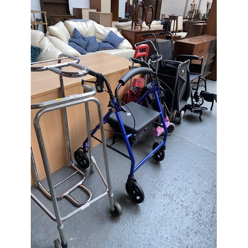 363 - A quantity of mobility aids including wheelchair etc.