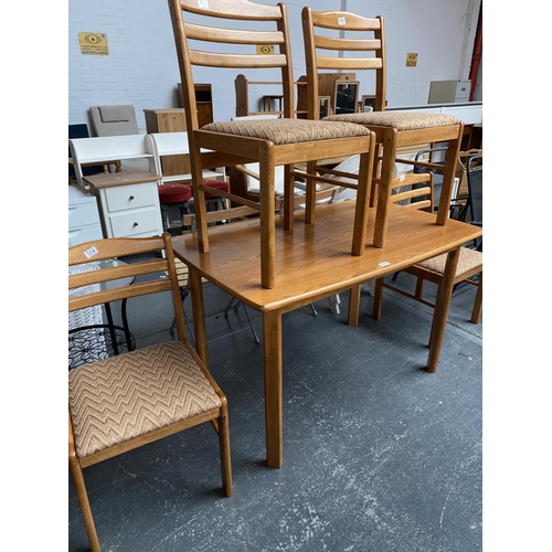 370 - A dining table and four chairs