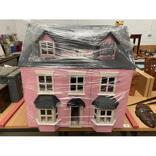 18 - A wooden dolls house