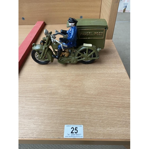 25 - A cast iron postman on motorcycle