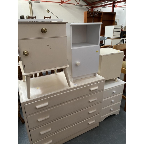 324 - A painted four drawer chest of drawers, painted bedside cabinet and storage box plus two modern beds... 
