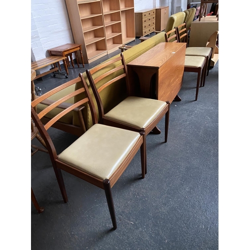 336 - A drop leaf table and four chairs
