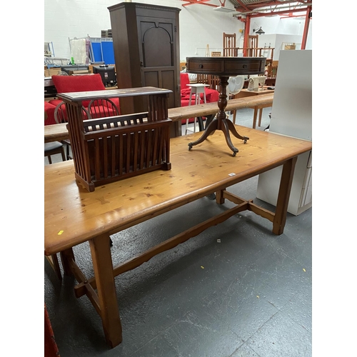 344 - A large pine dining table, magazine rack and telephone table