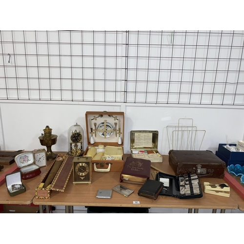 57 - A mixed vintage collection of items including Brexton picnic set, carriage clocks, first aid tin etc... 