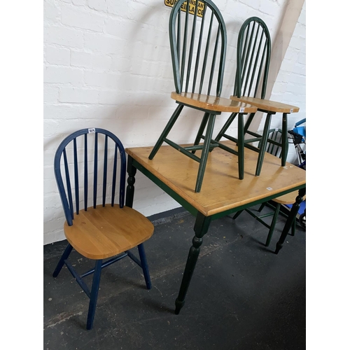 509 - A painted pine dining table and four chairs