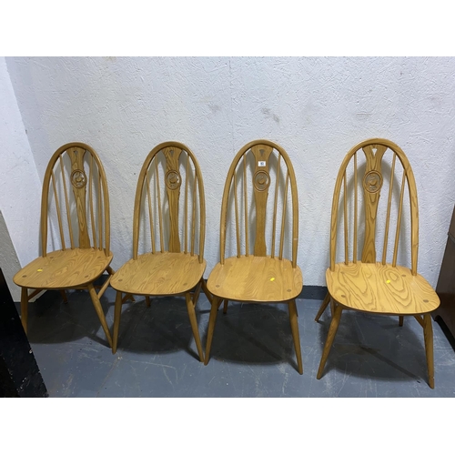 83 - Four Ercol swan chairs