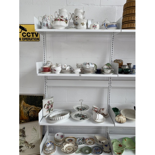 62 - Four shelves of mixed china including Royal Worcester, Royal Albert, Wedgwood etc.