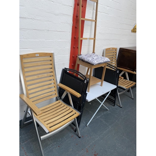 307 - Six fold up garden chairs, a pine chair and a plastic fold up table