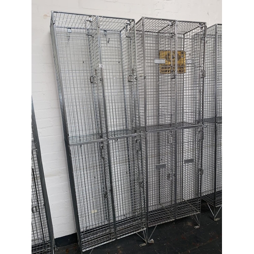 313 - Two metal cage lockers