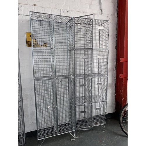318 - Two metal cage lockers