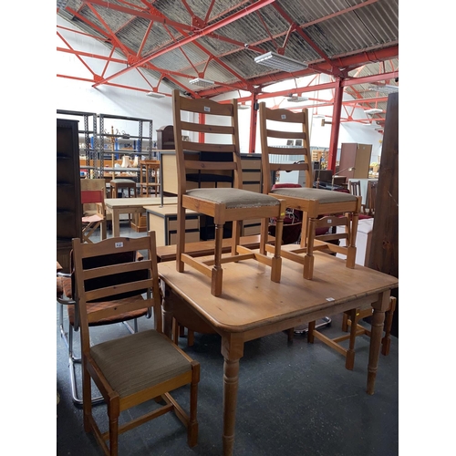 321 - Pine extending table and four chairs