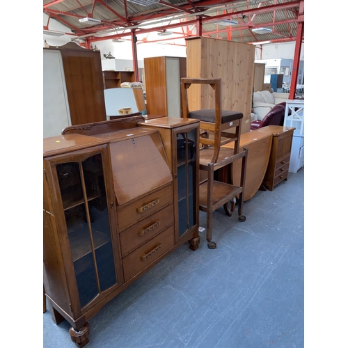 327 - A side unit, serving trolley, drop leaf table and chair and a sewing box