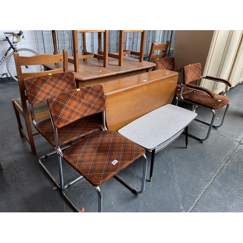 343 - A retro drop leaf table and four chairs and a retro coffee table