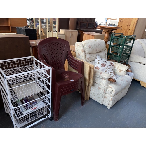 355 - An electric reclining armchair, four garden chairs ,metal rack, two fold up tables etc.