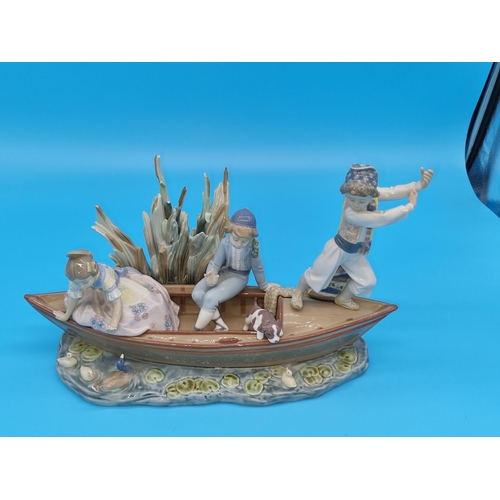 189 - A large Lladro figure of a boating scene marked by R Torrijos No 57 and decorated by E Ordaz