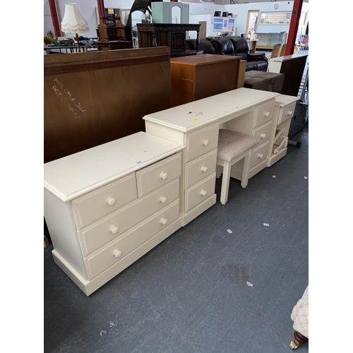 329 - A cream dressing table, stool and matching chest of drawers and bedside table