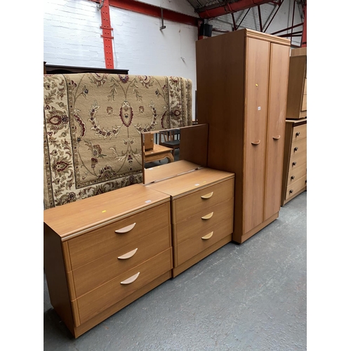 357 - Wardrobe and matching chest of drawers, dresser and mirror