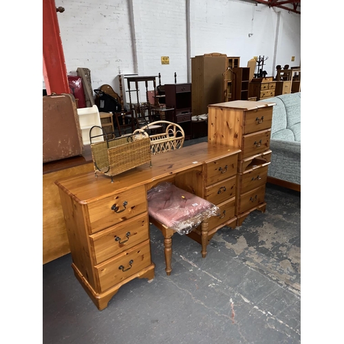 360 - A pine dressing table and stool and two bedside cabinets