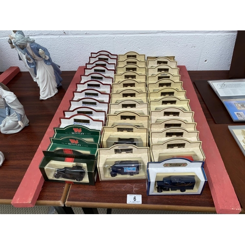 6 - A collection of boxed Lledo ' Days Gone' vehicles etc.