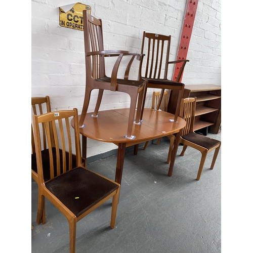 305 - An extending dining table and six chairs