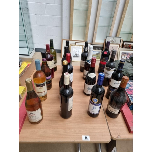 36 - A collection of mixed alcohol including red and white wine etc.