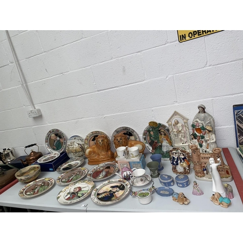 6 - Staffordshire figures, lions, Royal Doulton bowl, plates , Wedgwood vases, Pendelfin figures etc.