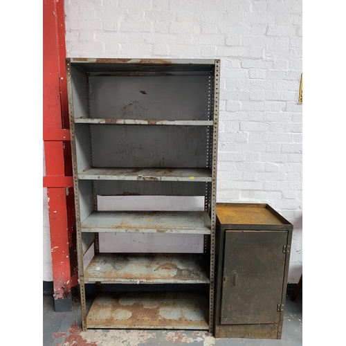 540 - A metal shelving unit and a small metal cabinet