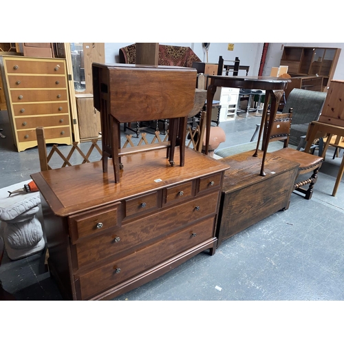 560 - A Stag chest of drawers, oak blanket box, side table etc.